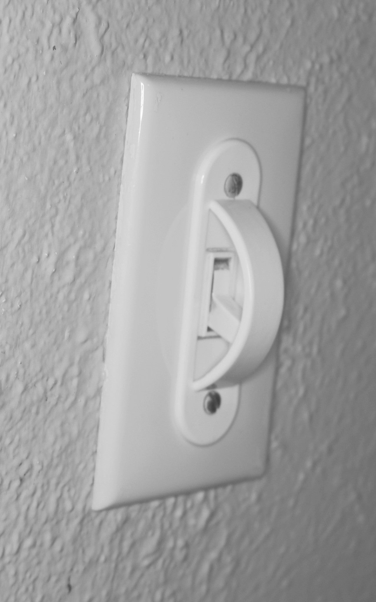 White Switch Plate Cover Guard Keeps Light Switch ON or Off protects your lights or circuits from accidentally being turned on or off.