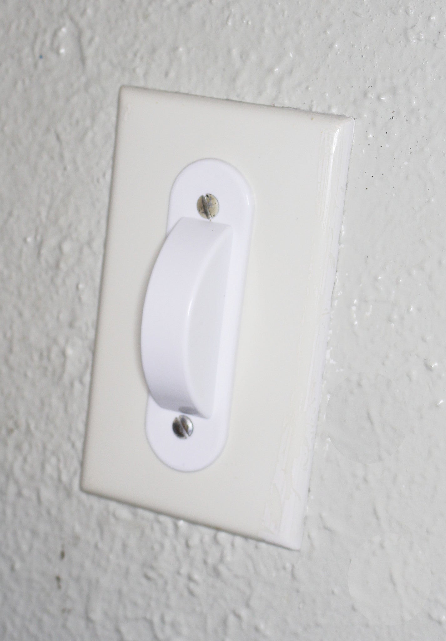 White Switch Plate Cover Guard Keeps Light Switch ON or Off protects your lights or circuits from accidentally being turned on or off.